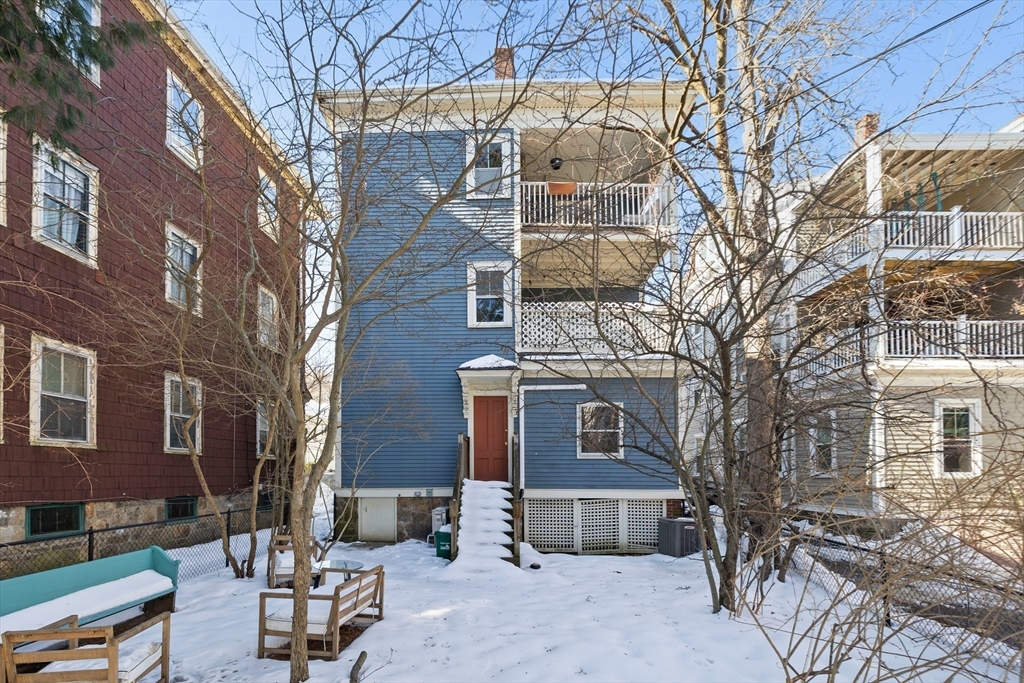112 Franklin Street, Unit 3 Brookline, MA 02445 - Photo 15 of 16 a front view of a building with large tree