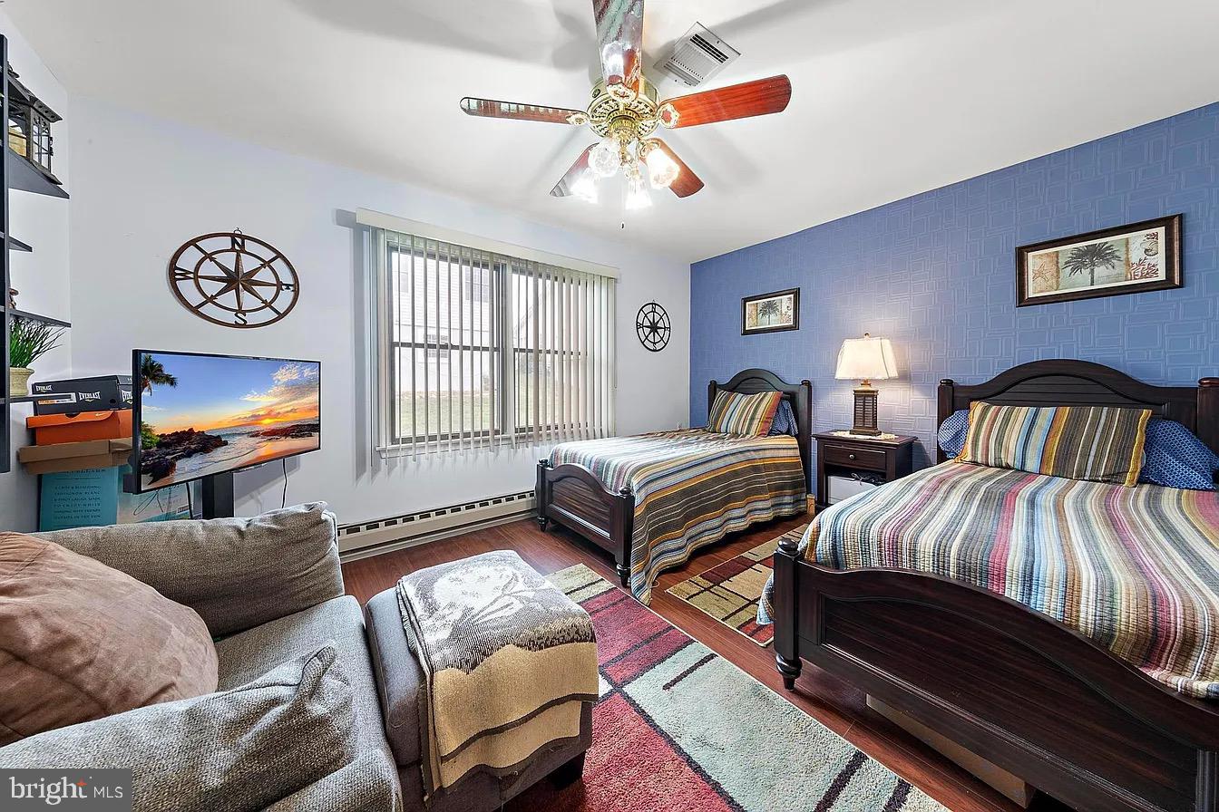 22 Fir Road Manahawkin, NJ 08050 - Photo 21 of 35 a bedroom with two beds and a large window