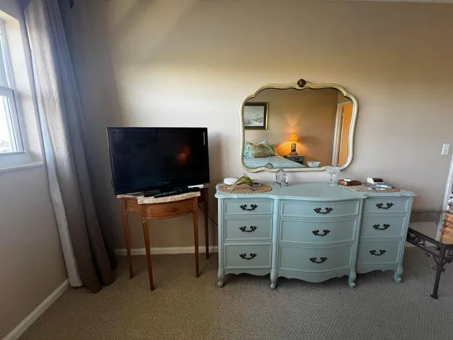 a view of living room with flat screen tv