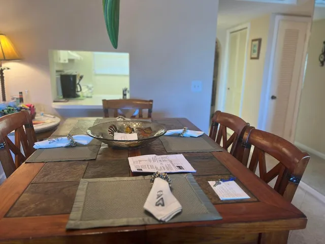 a view of a dining room with furniture