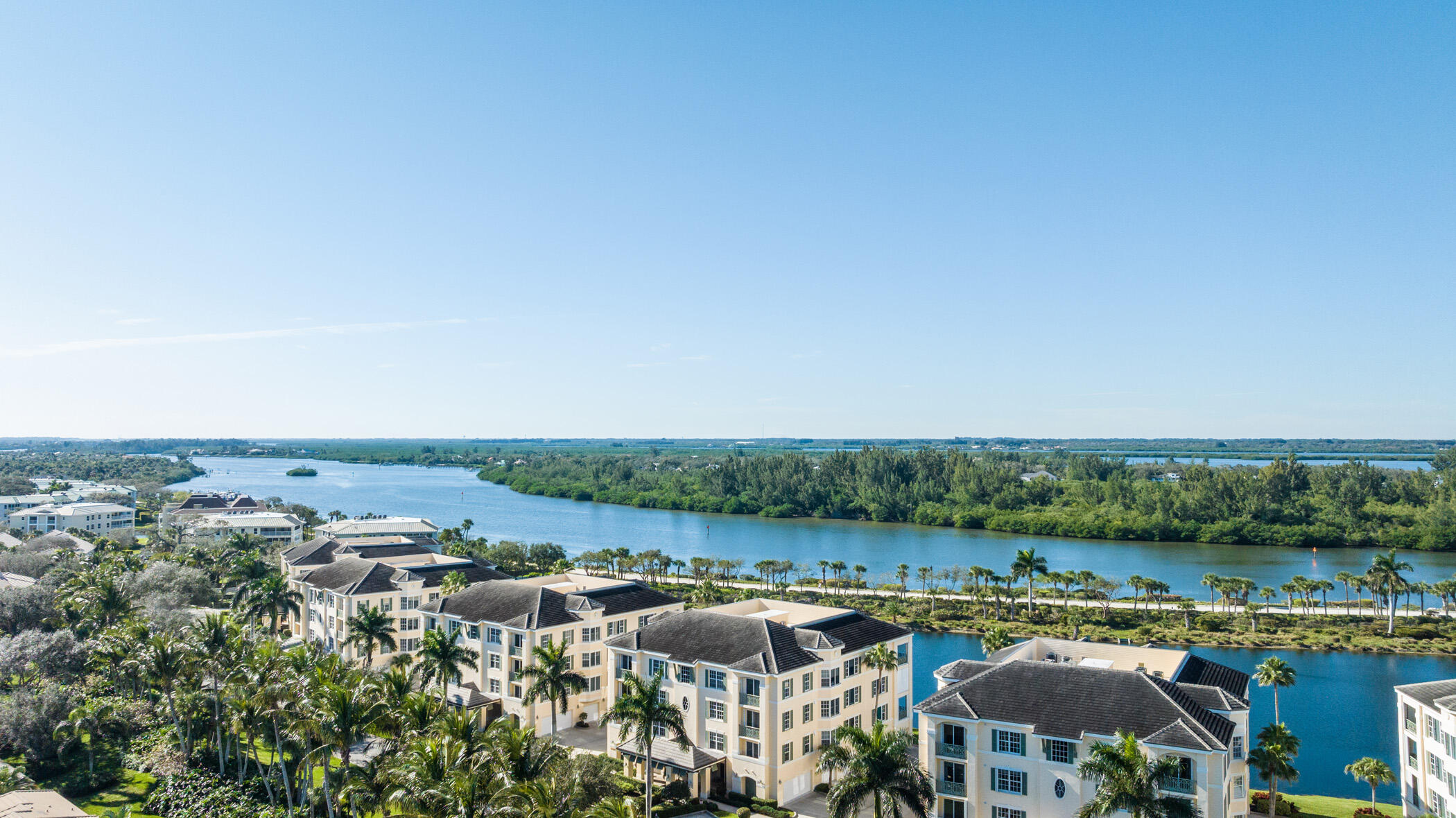 9025 Somerset Bay Lane, Unit 302 Vero Beach, FL 32963 - Photo 21 of 30 an aerial view of a city with lake view