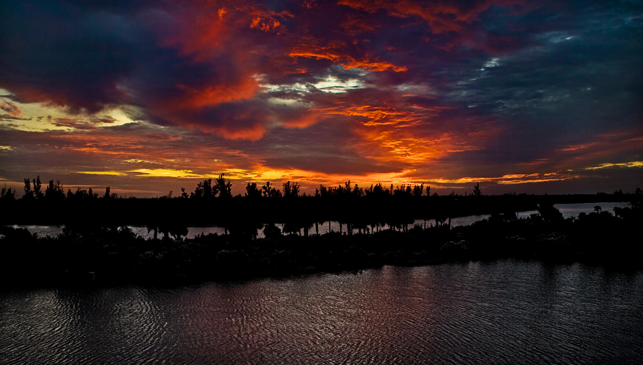 9025 Somerset Bay Lane, Unit 302 Vero Beach, FL 32963 - Photo 22 of 30 a view of sunset