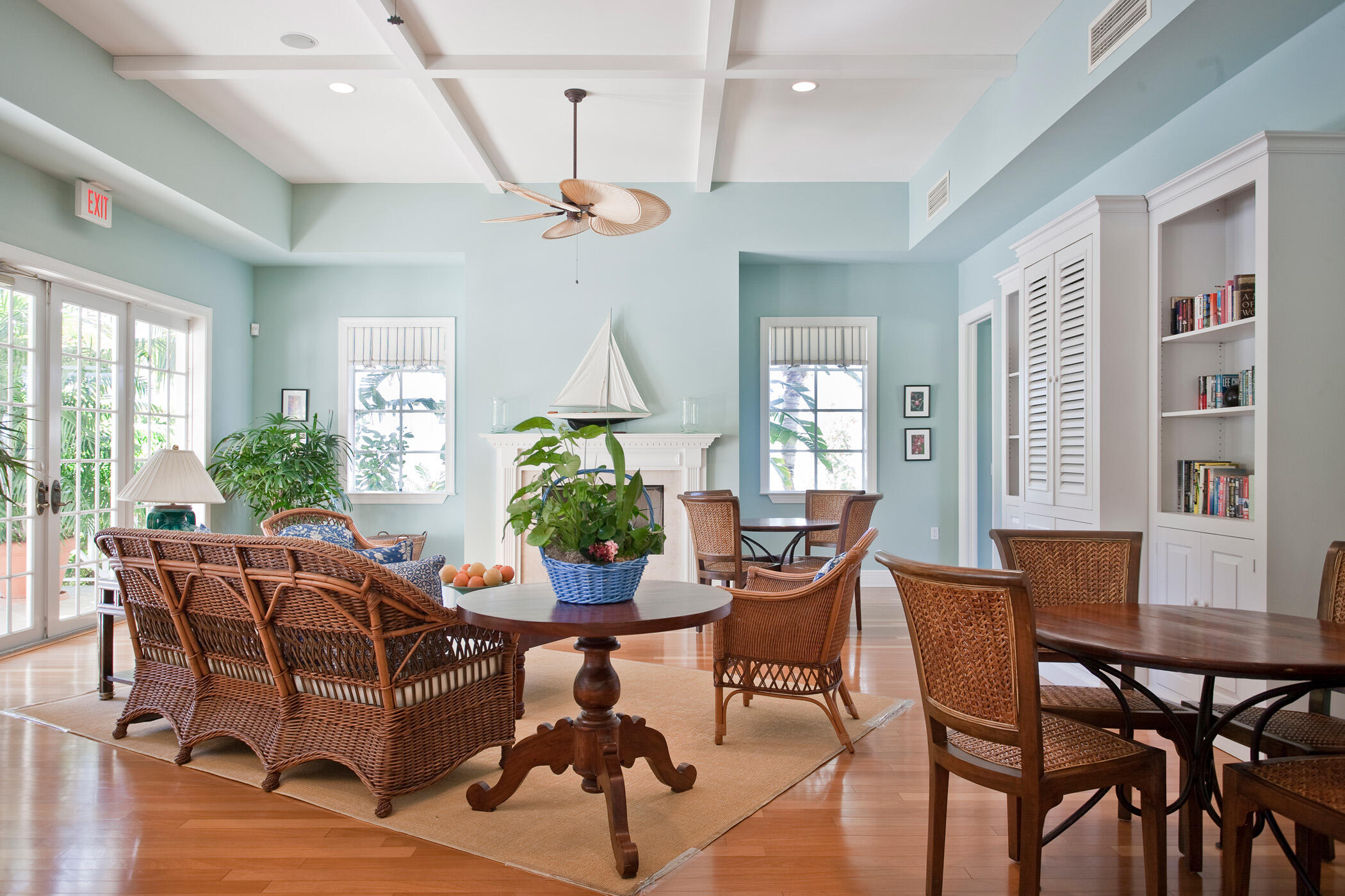 9025 Somerset Bay Lane, Unit 302 Vero Beach, FL 32963 - Photo 27 of 30 a view of a dining room with furniture window and wooden floor