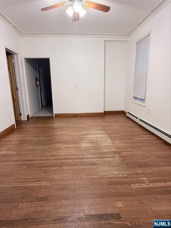 242 Grant Avenue, Unit 2 East Newark, NJ 07029 - Photo 4 of 9 a view of an empty room with chandelier fan