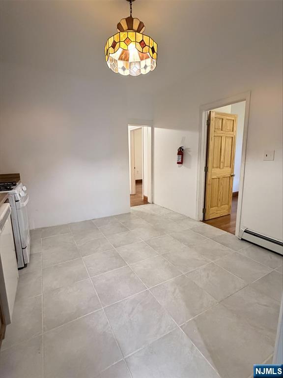 242 Grant Avenue, Unit 2 East Newark, NJ 07029 - Photo 6 of 9 a view of an empty room with a window