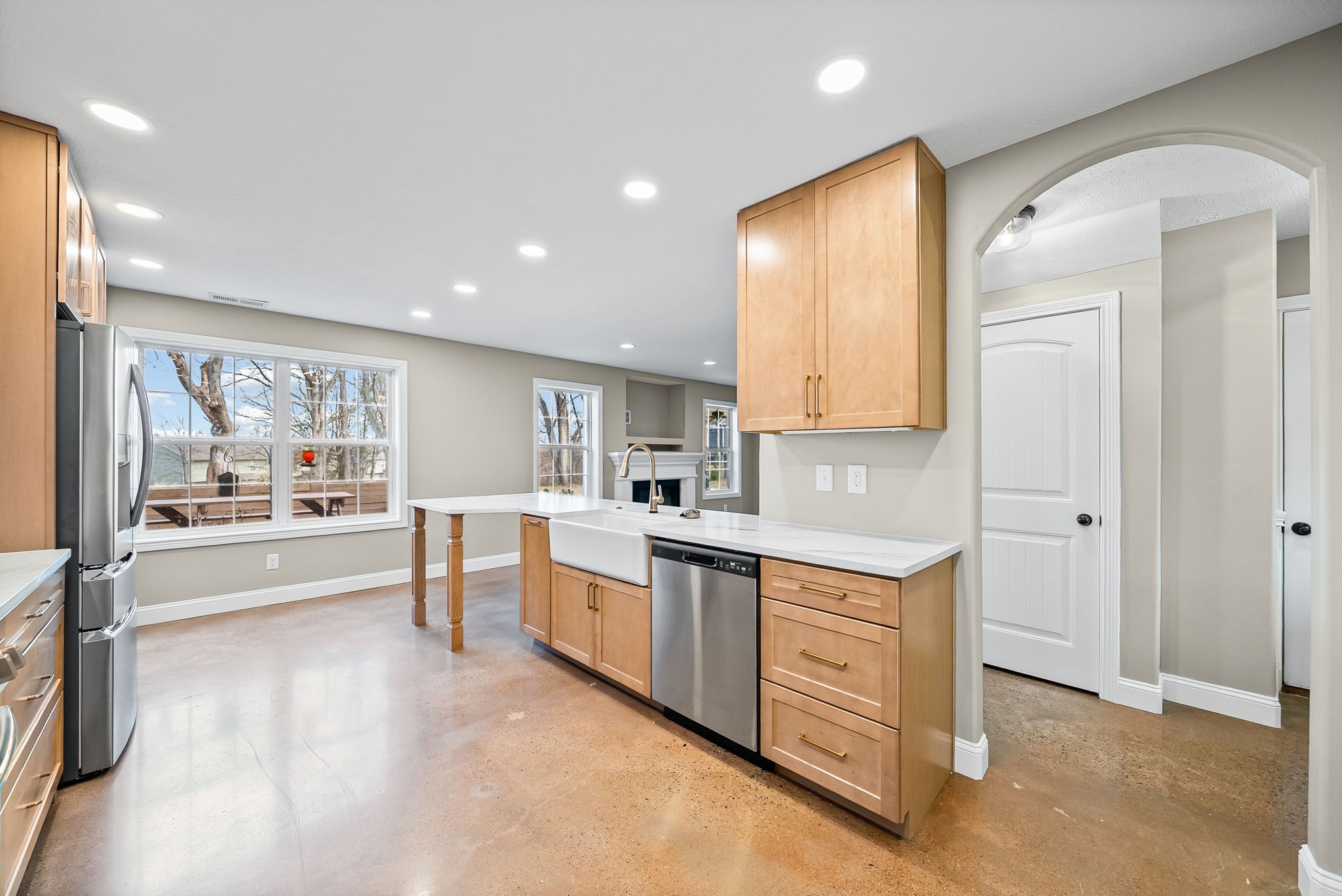1903 East Boy Scout Road Clarksville, TN 37042 - Photo 12 of 36 a large kitchen with granite countertop a large counter top space a sink stainless steel appliances and cabinets