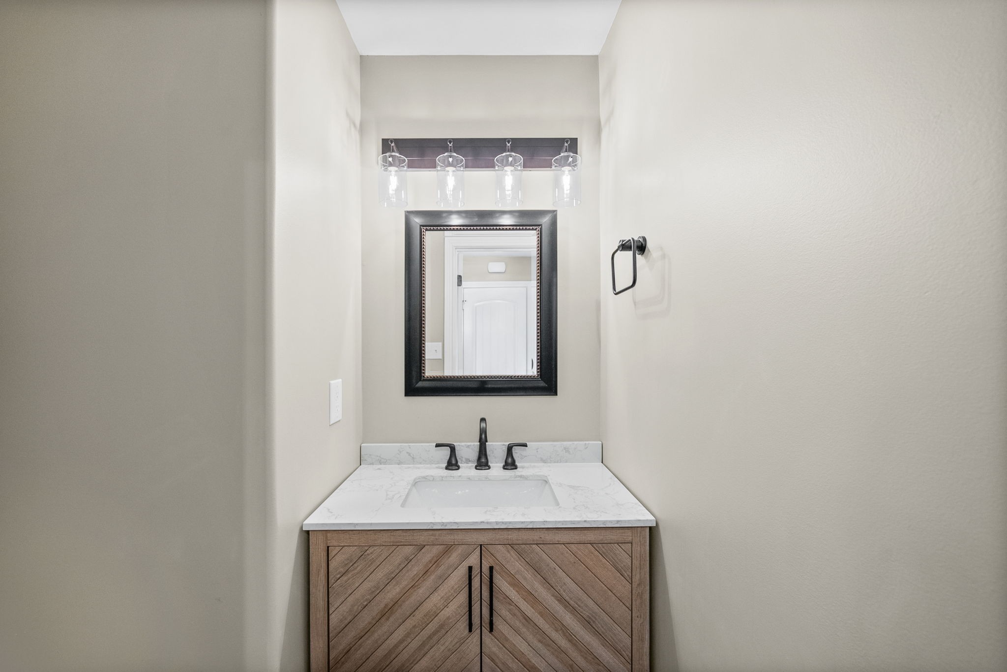 1903 East Boy Scout Road Clarksville, TN 37042 - Photo 16 of 36 a bathroom with a granite countertop sink and a mirror