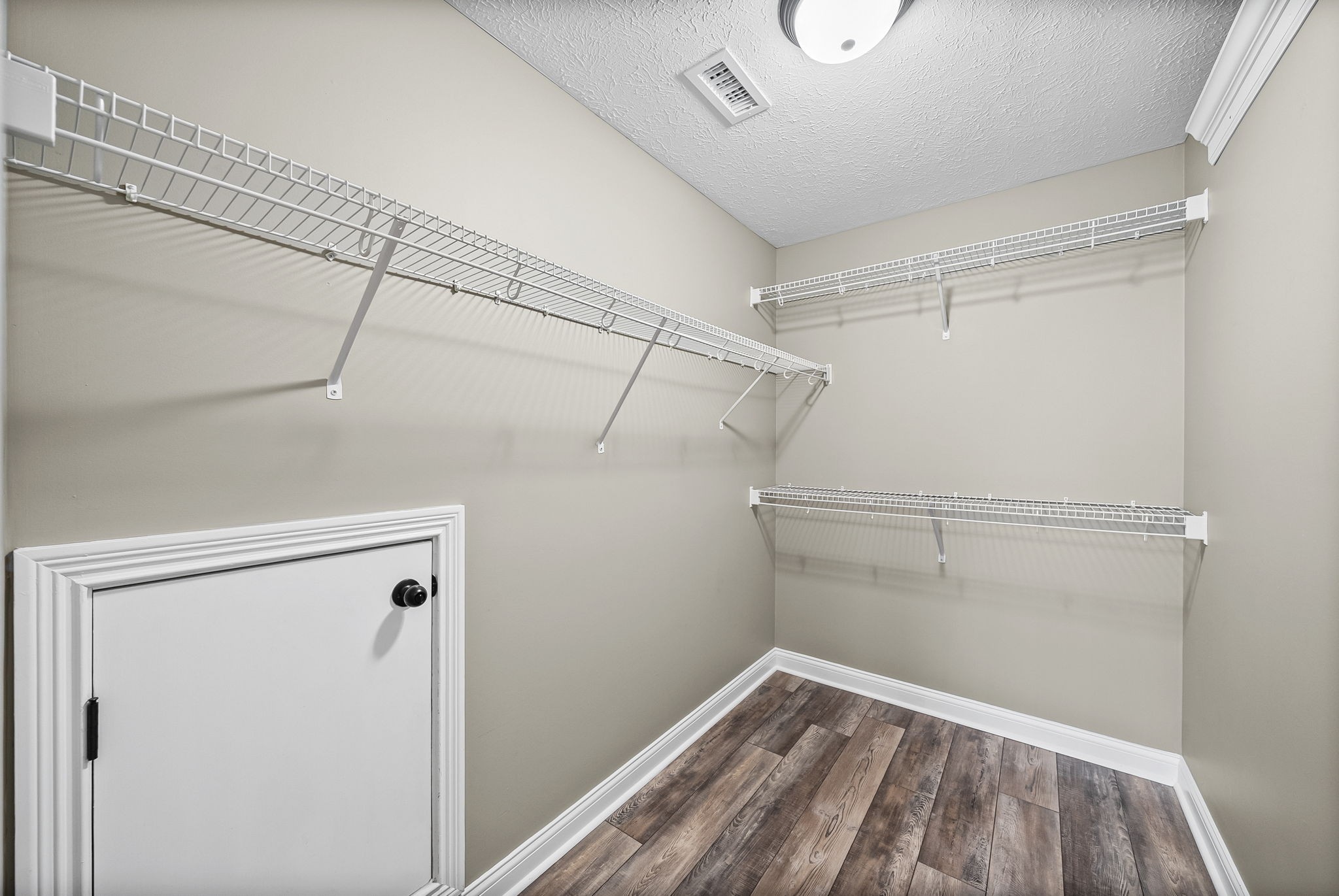 1903 East Boy Scout Road Clarksville, TN 37042 - Photo 25 of 36 a view of a room with racks on the wall