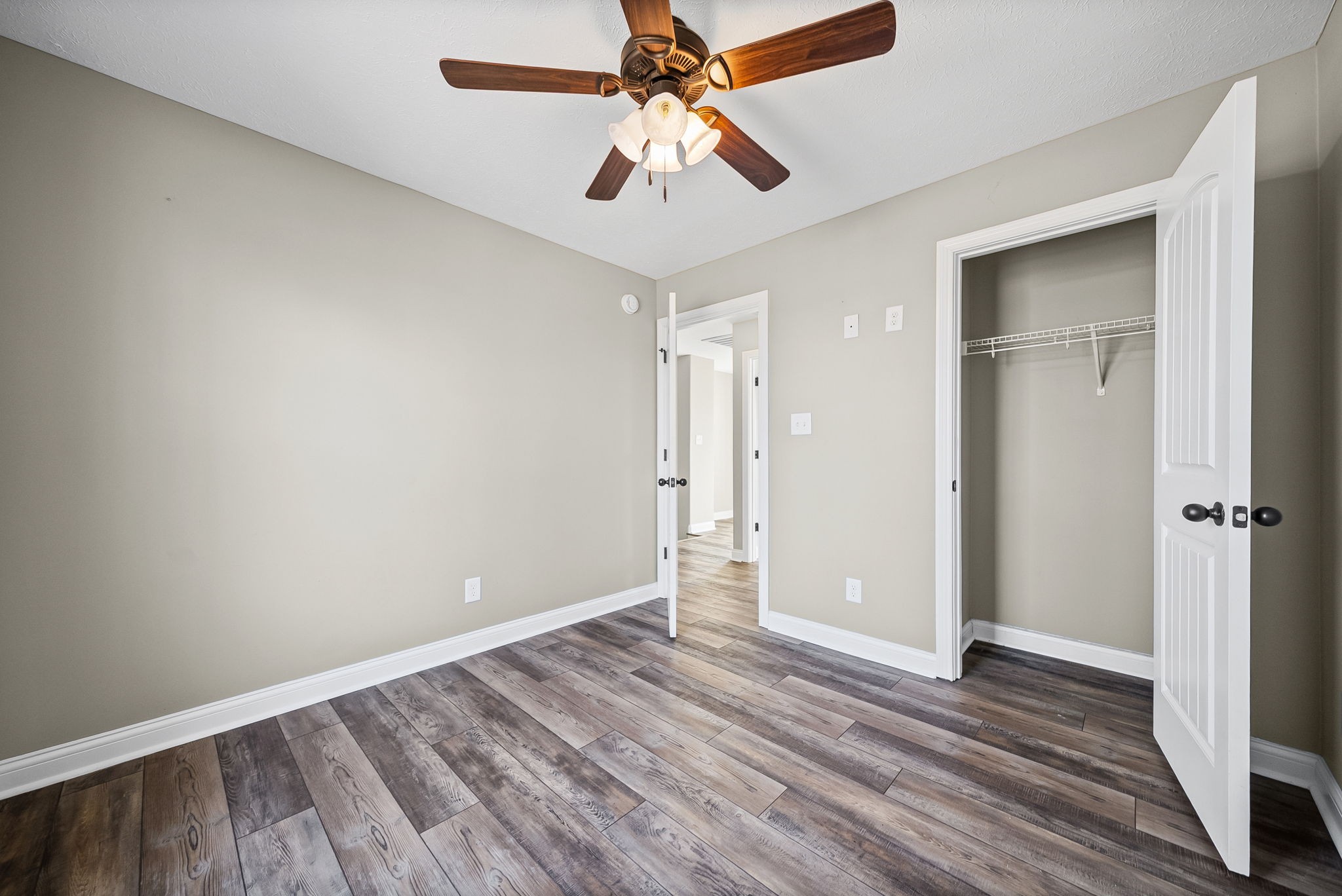 1903 East Boy Scout Road Clarksville, TN 37042 - Photo 30 of 36 wooden floor in an empty room with a window