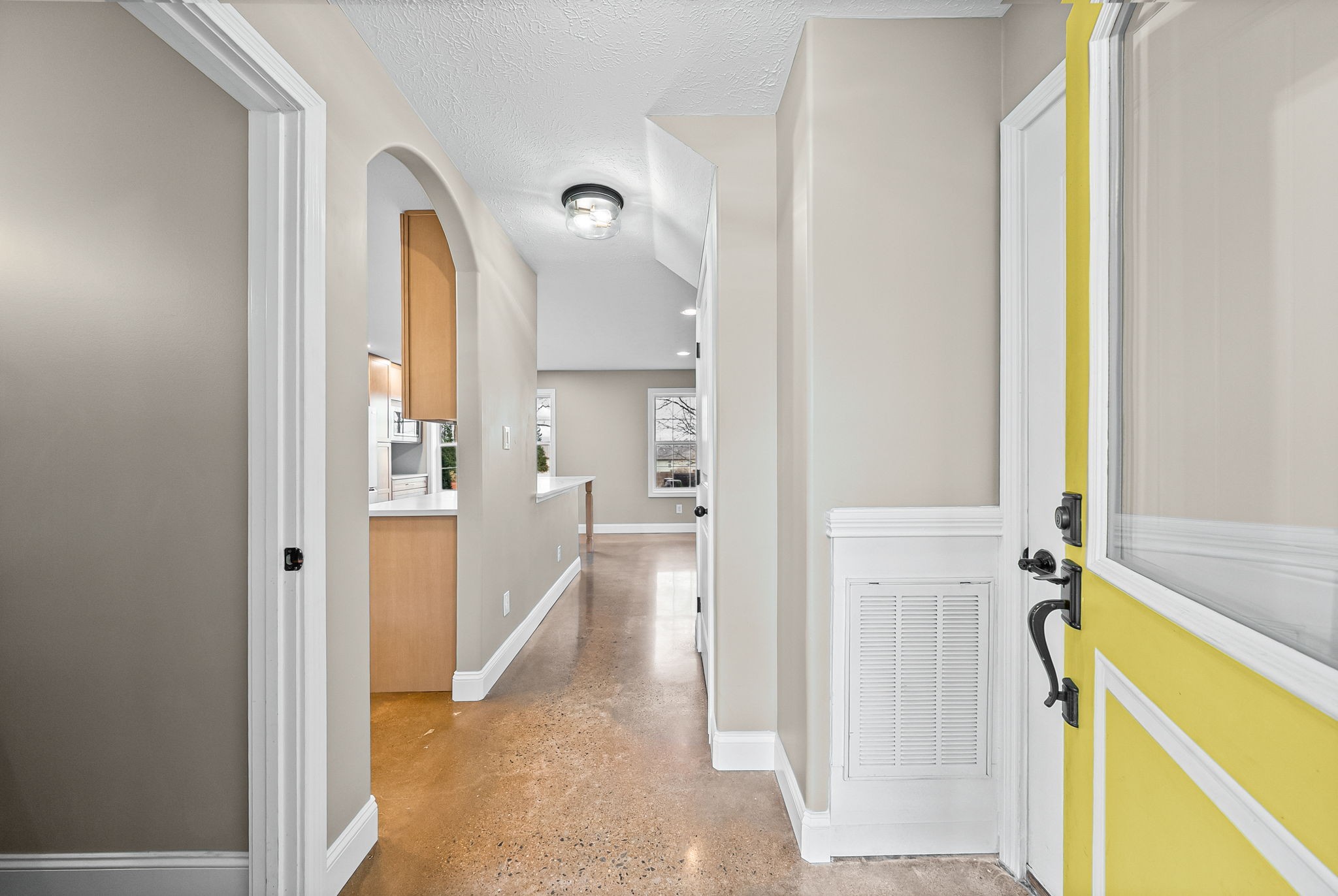 1903 East Boy Scout Road Clarksville, TN 37042 - Photo 5 of 36 a view of a hallway with wooden floor and a bathroom