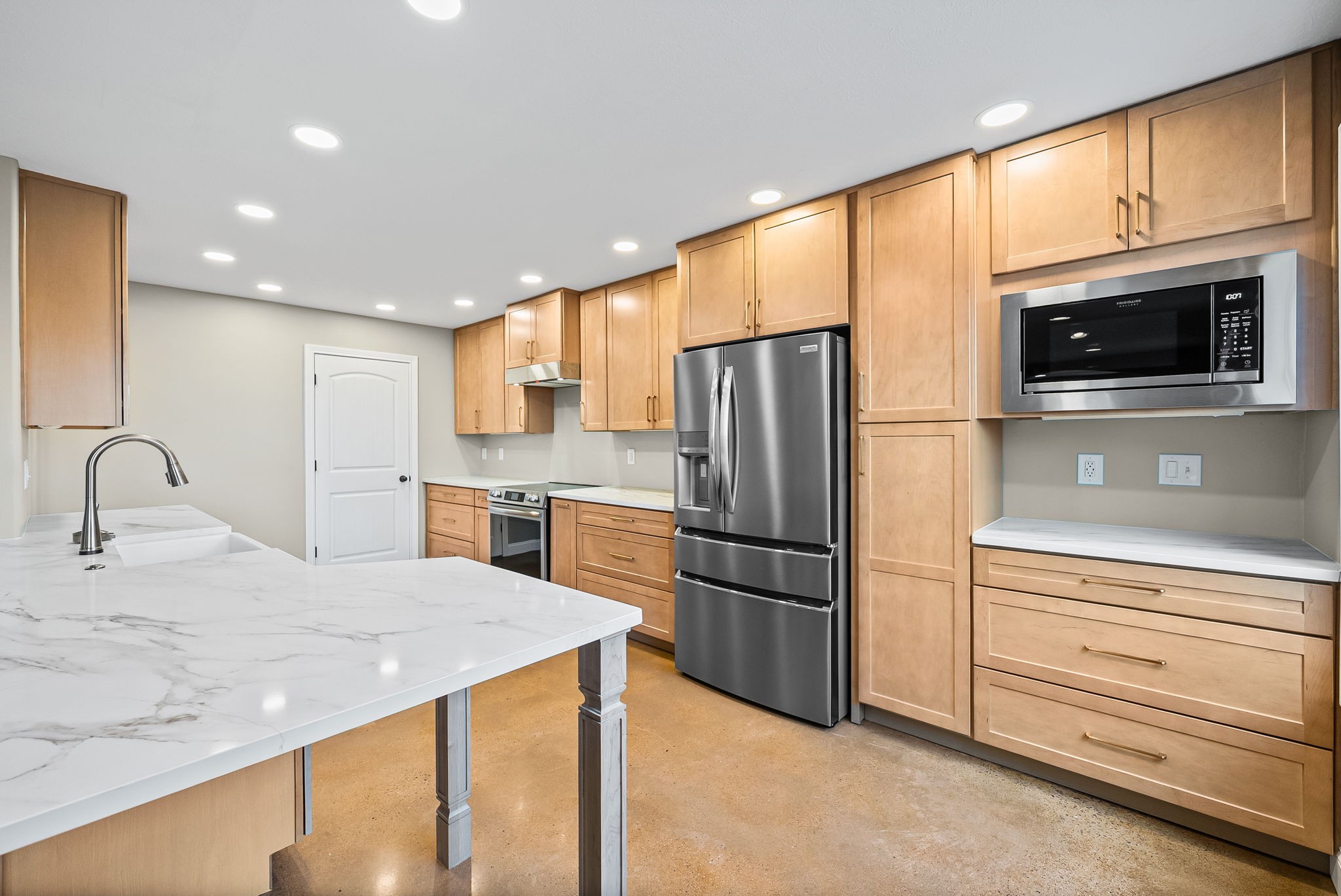 1903 East Boy Scout Road Clarksville, TN 37042 - Photo 10 of 36 a kitchen with refrigerator cabinets and a sink