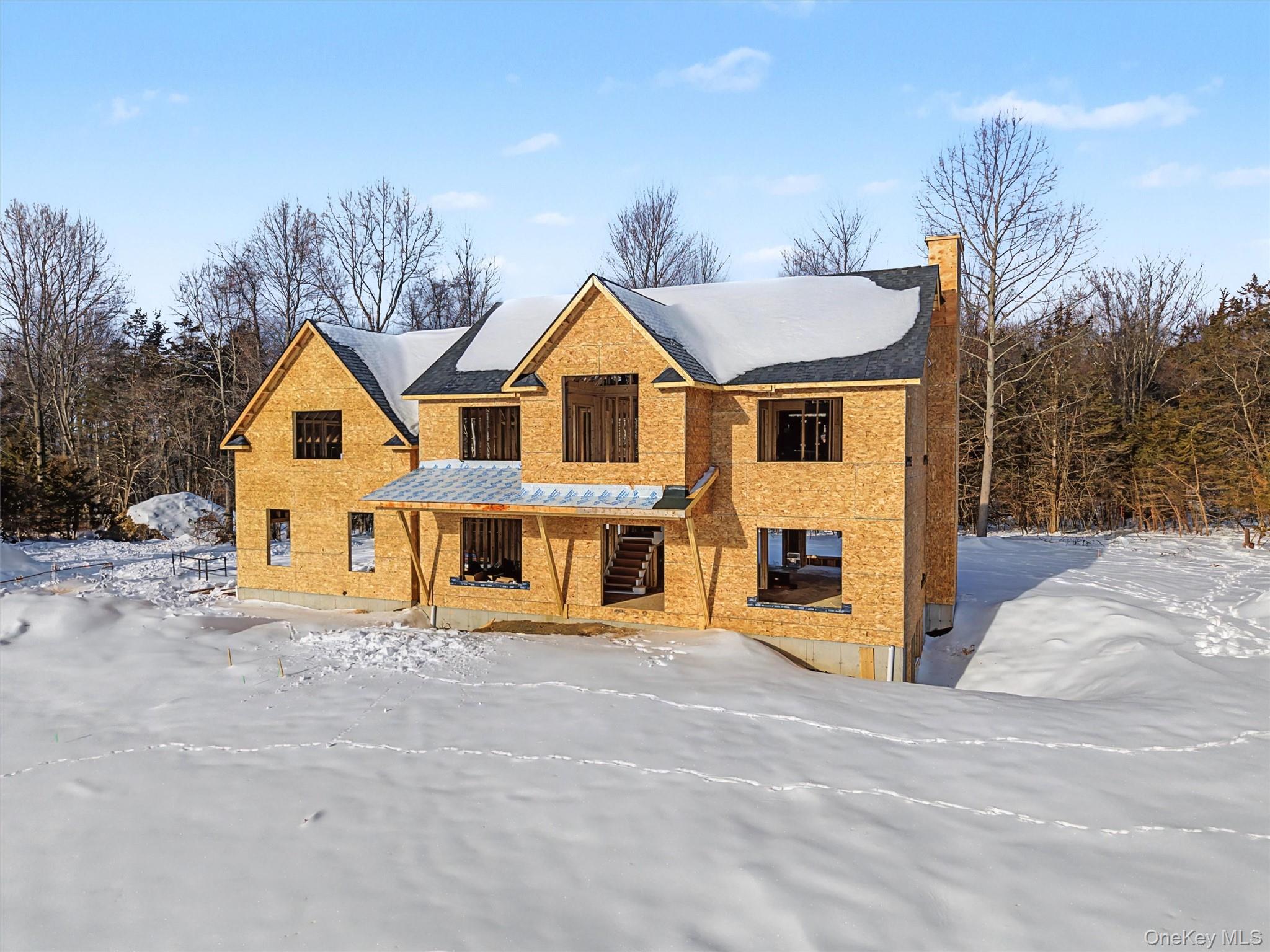 493 Union Corners Road Florida, NY 10921 - Photo 11 of 26 a front view of a house with a yard and trees