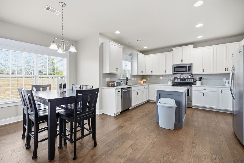511 Cromer Road Townville, SC 29689 - Photo 16 of 45 This bright and open kitchen features sleek appliances, ample cabinetry, and a functional island.