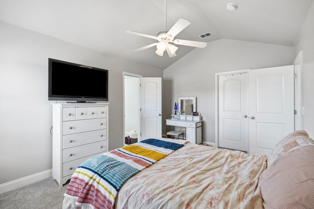 511 Cromer Road Townville, SC 29689 - Photo 35 of 45 This cozy bedroom features high ceilings and soft carpet, creating a peaceful and comfortable retreat.