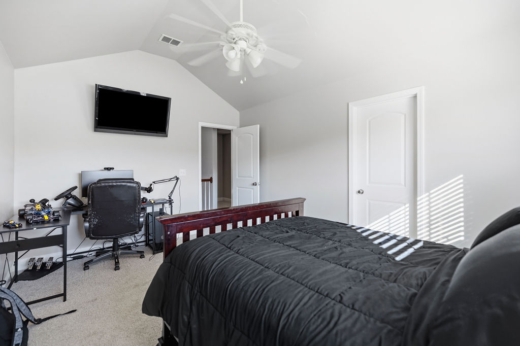 511 Cromer Road Townville, SC 29689 - Photo 40 of 45 This spacious bedroom features vaulted ceilings and ample natural light, creating an airy and bright retreat.