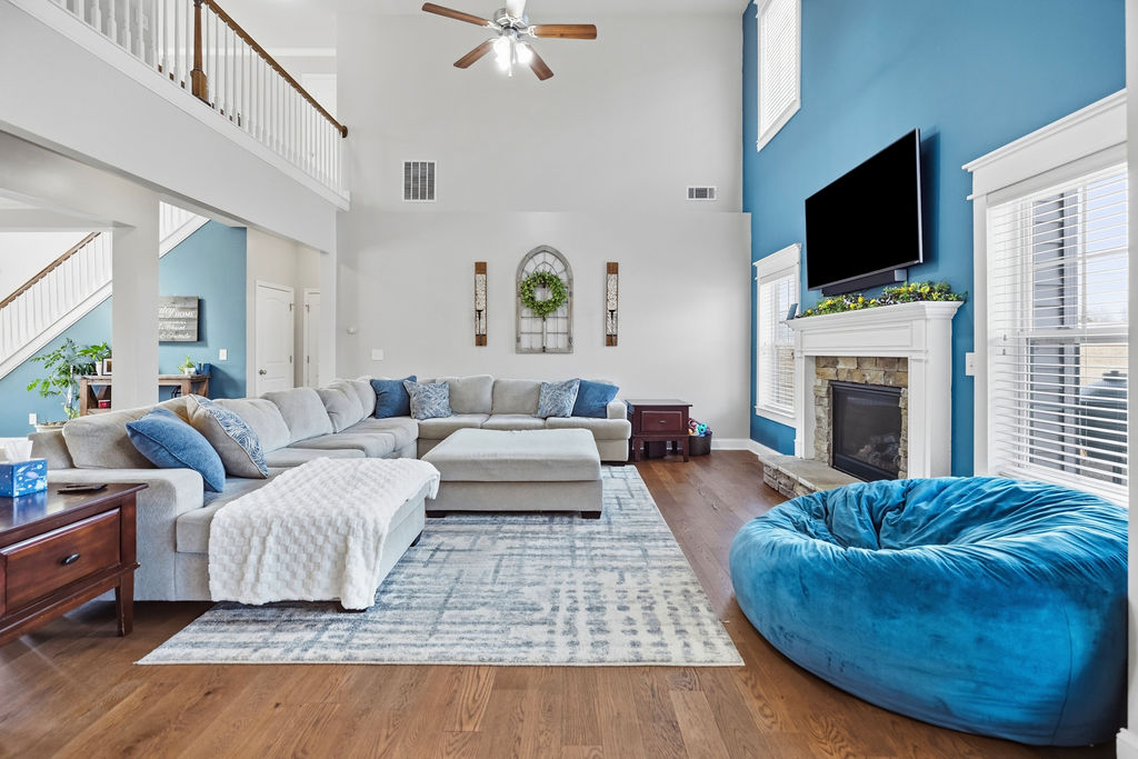 511 Cromer Road Townville, SC 29689 - Photo 7 of 45 This expansive living area features a grand fireplace and vaulted ceilings.