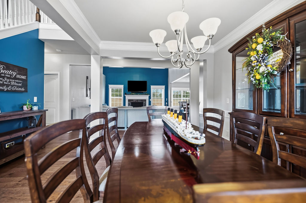 511 Cromer Road Townville, SC 29689 - Photo 9 of 45 This spacious dining area seamlessly flows into an inviting living space, perfect for entertaining.