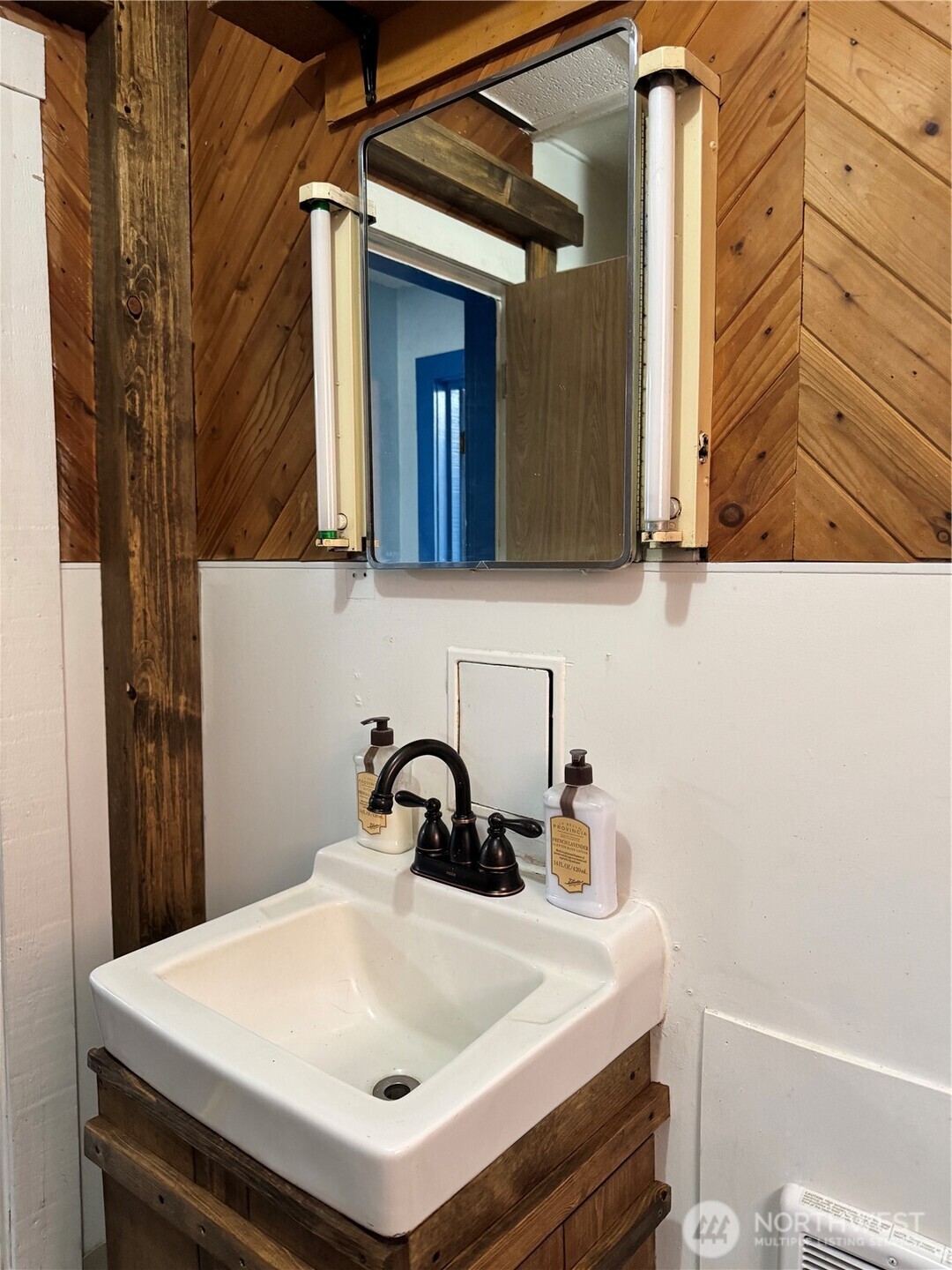 61 North Kean Street Republic, WA 99166 - Photo 12 of 34 a bathroom with a sink and a mirror