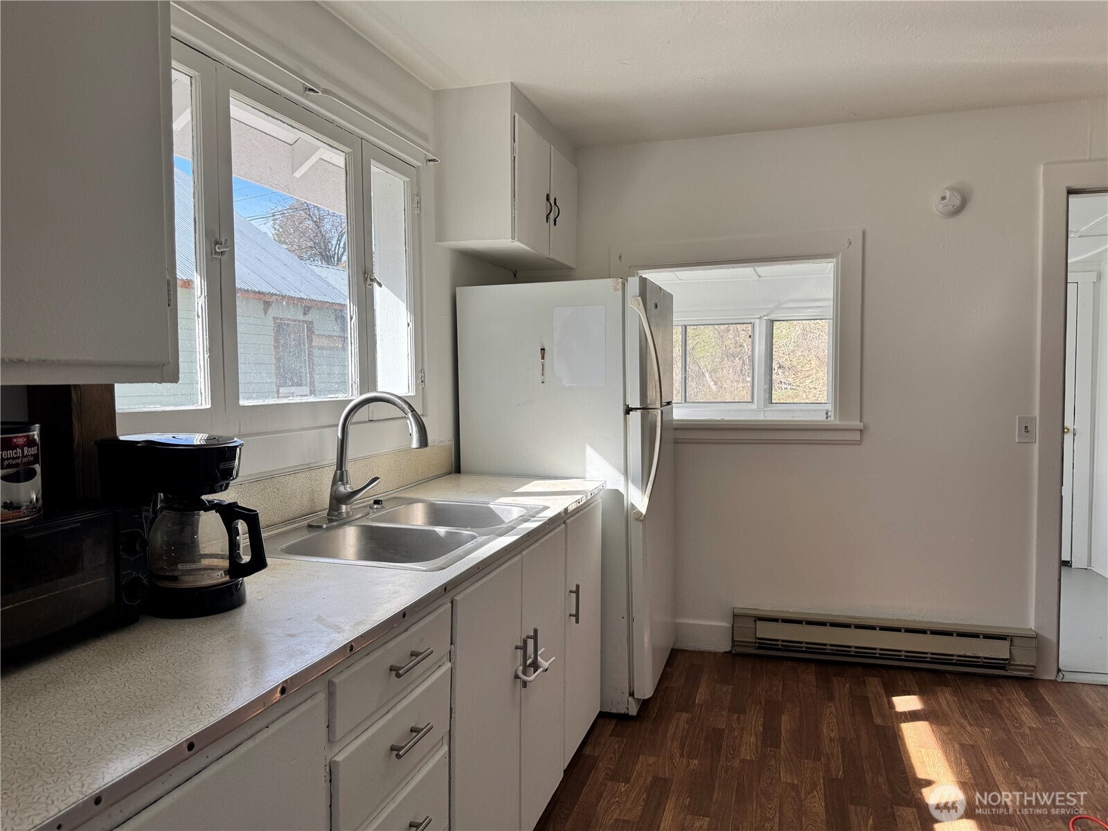 61 North Kean Street Republic, WA 99166 - Photo 6 of 34 a kitchen with a sink and cabinets