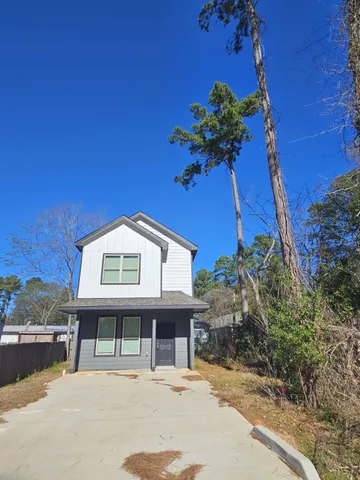 a house view with a outdoor space