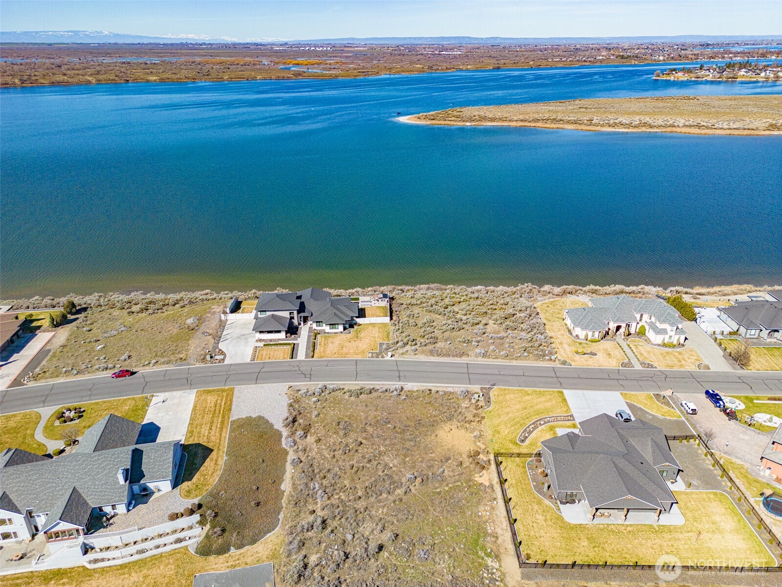 7382 Dune Lake Road Southeast Moses Lake, WA 98837 - Photo 1 of 13 a view of swimming pool with an ocean view