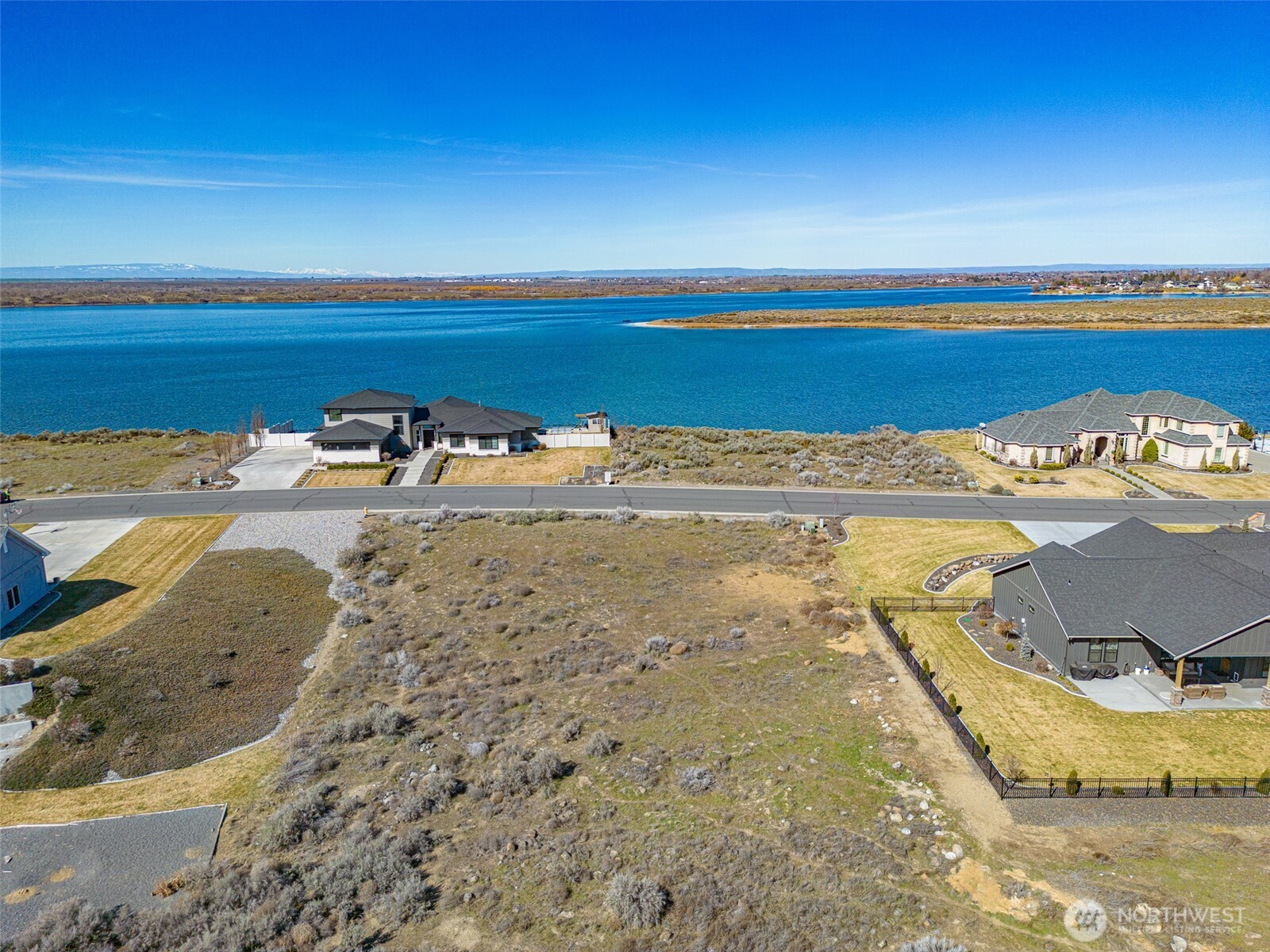 7382 Dune Lake Road Southeast Moses Lake, WA 98837 - Photo 2 of 13 a view of ocean view with beach