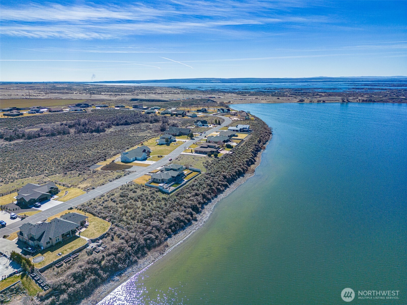 7382 Dune Lake Road Southeast Moses Lake, WA 98837 - Photo 7 of 13 a view of lake and mountain
