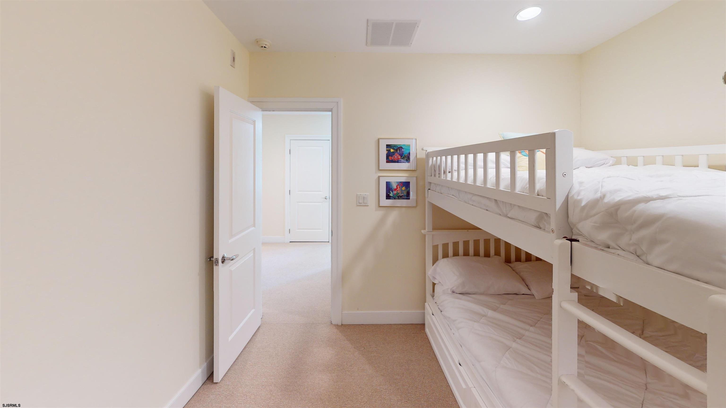 214 North Decatur Avenue, Unit 3B Margate City, NJ 08402 - Photo 19 of 41 a view of a hallway with stairs