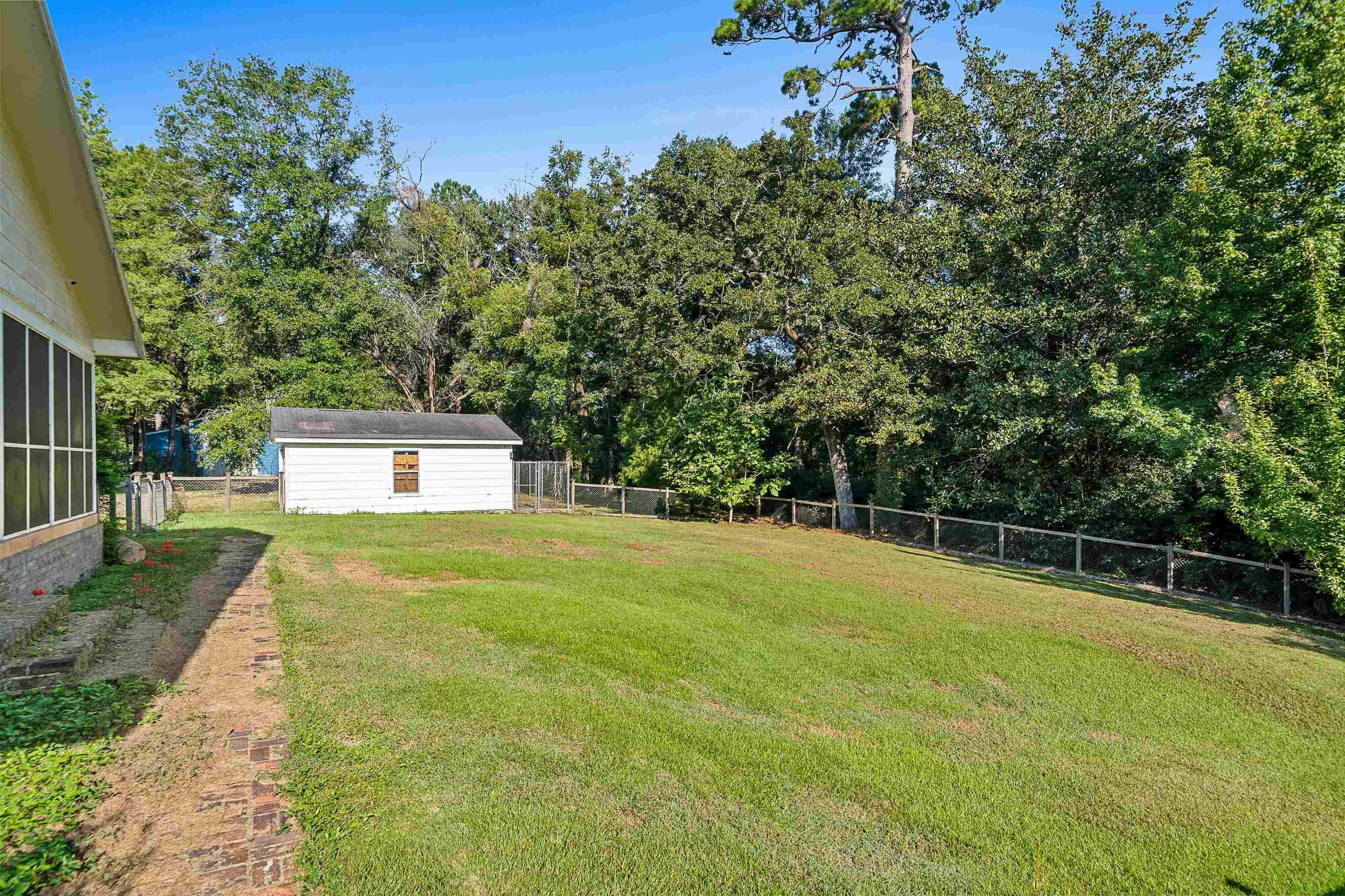 9350 Tompkins Road Stockton, AL 36579 - Photo 31 of 36 Fenced backyard featuring view of scattered trees