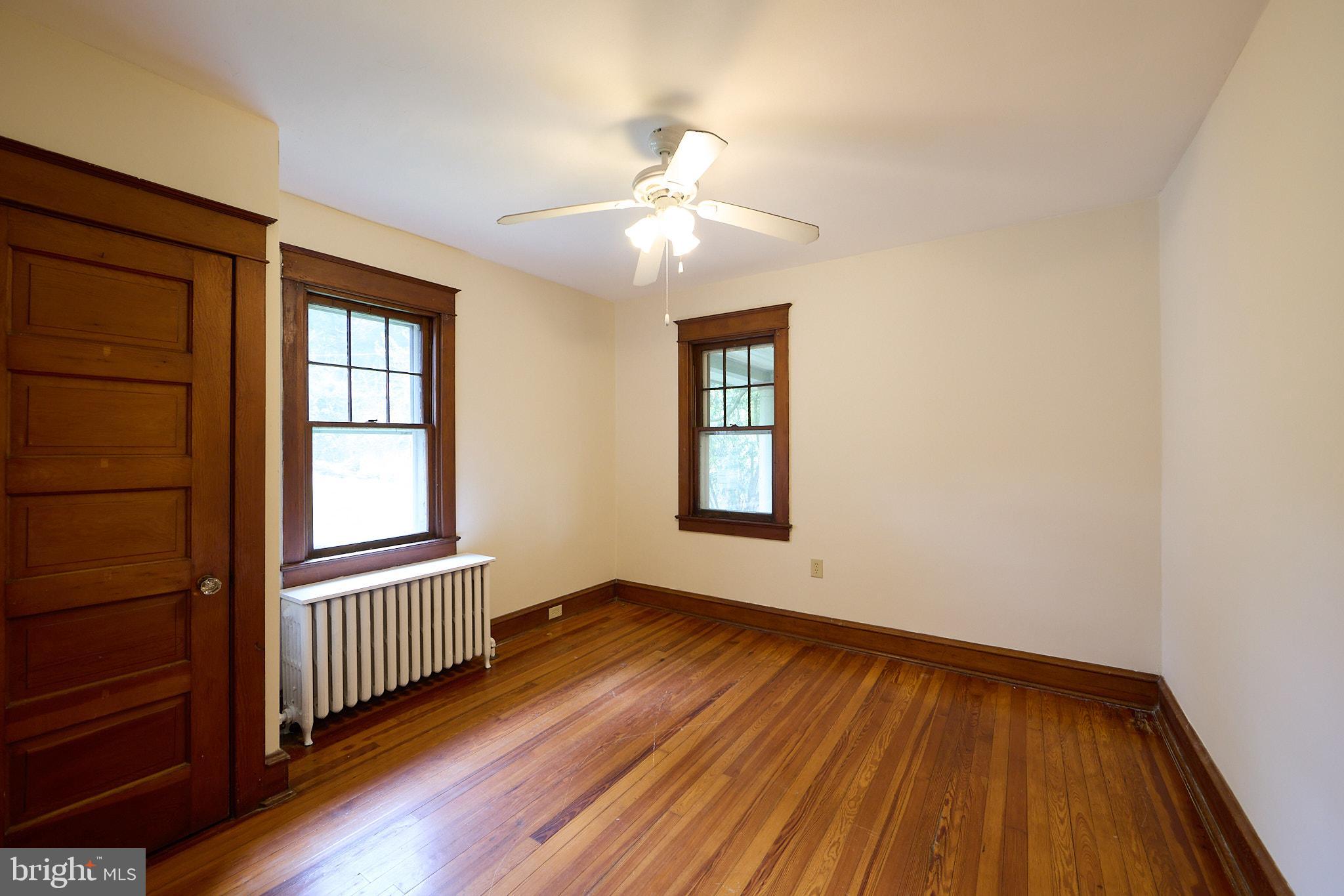 53 West Knowlton Road Media, PA 19063 - Photo 14 of 20 wooden floor in an empty room with a window