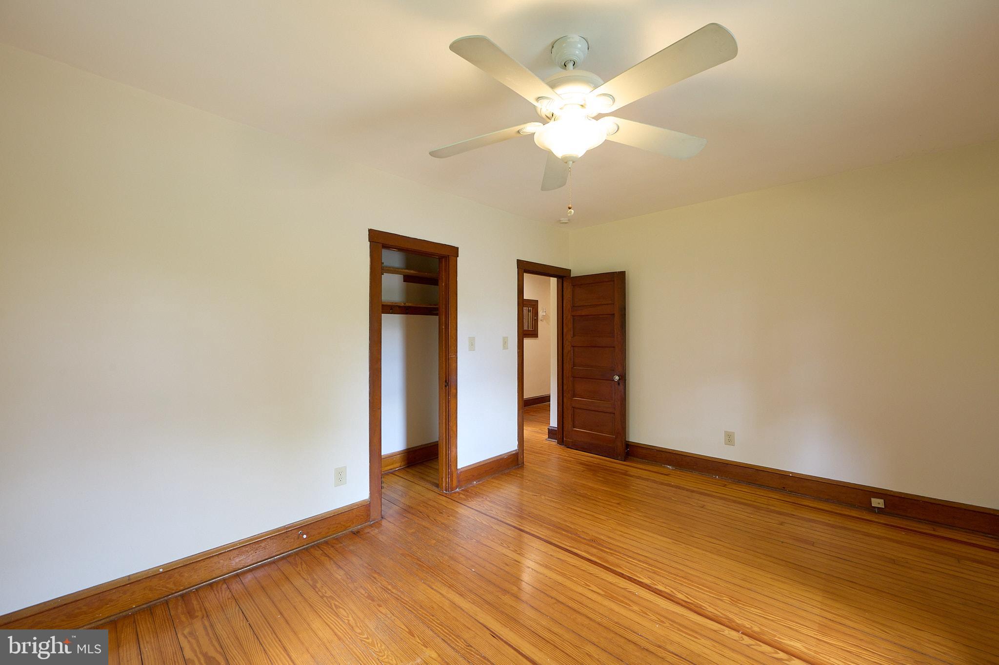 53 West Knowlton Road Media, PA 19063 - Photo 17 of 20 an empty room with wooden floor and ceiling fan