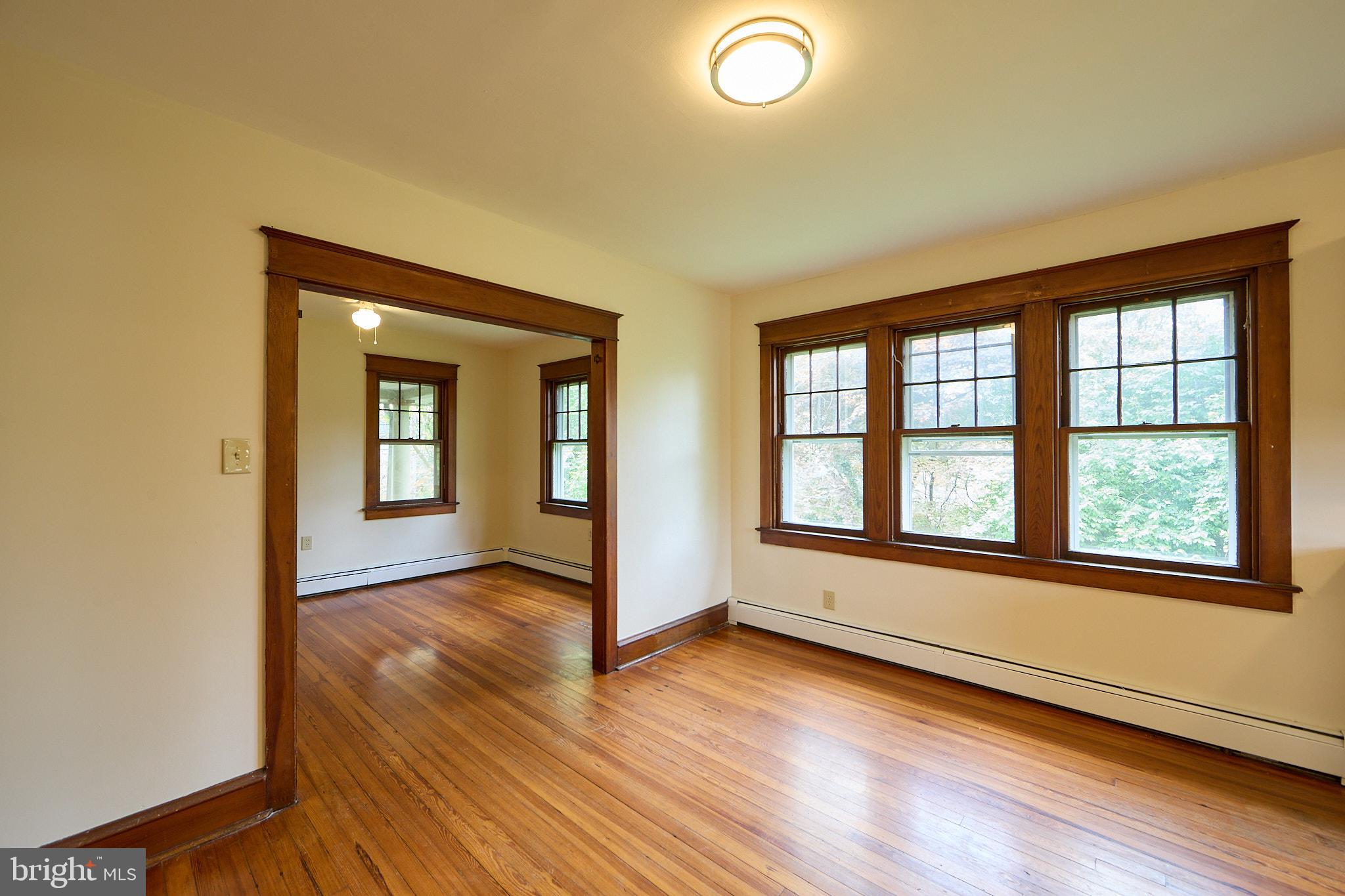 53 West Knowlton Road Media, PA 19063 - Photo 6 of 20 an empty room with wooden floor and windows