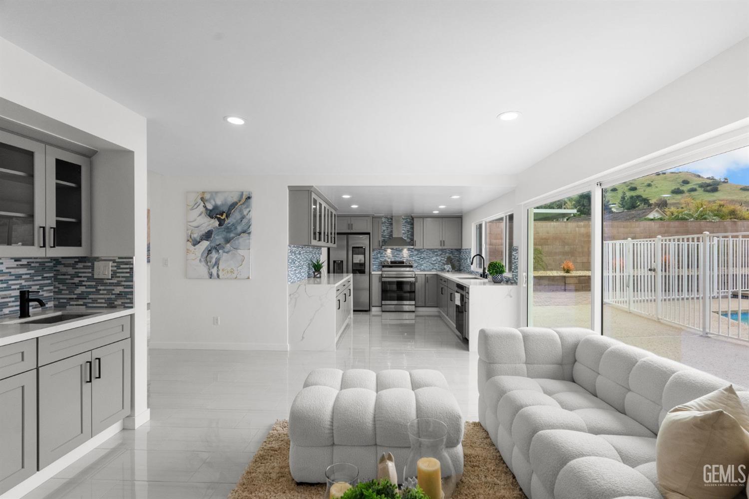 Undisclosed Address Sun Valley, CA 91352 - Photo 11 of 44 a living room with furniture and a large window