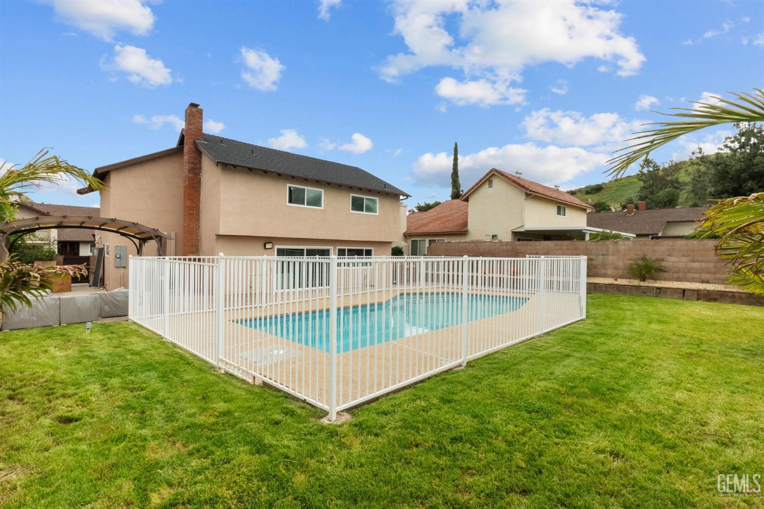 Undisclosed Address Sun Valley, CA 91352 - Photo 18 of 44 a view of a house with a backyard and a patio