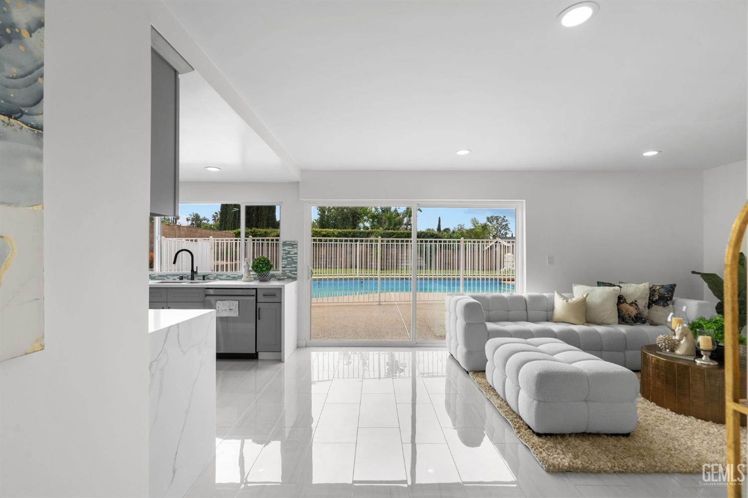 Undisclosed Address Sun Valley, CA 91352 - Photo 2 of 44 a living room with furniture and a floor to ceiling window