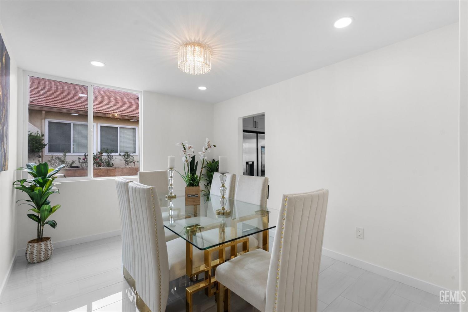 Undisclosed Address Sun Valley, CA 91352 - Photo 3 of 44 a view of a dining room with furniture and a potted plant