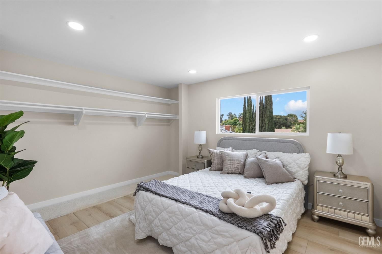 Undisclosed Address Sun Valley, CA 91352 - Photo 31 of 44 a bedroom with a bed and a night stand