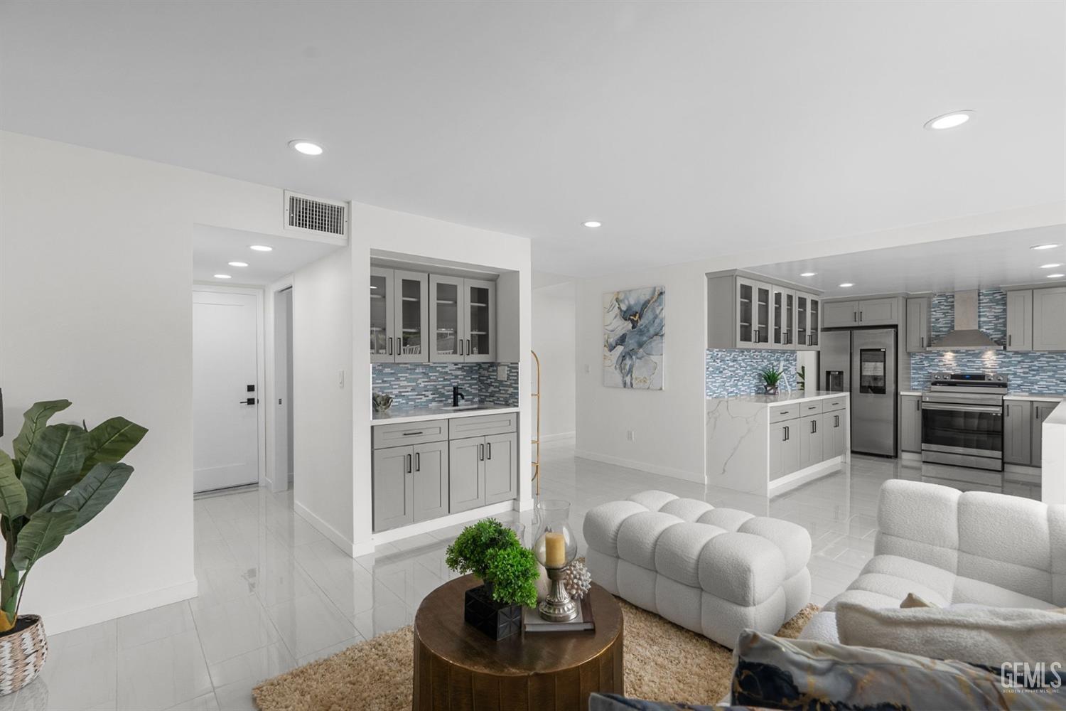 Undisclosed Address Sun Valley, CA 91352 - Photo 4 of 44 a living room with furniture and a kitchen