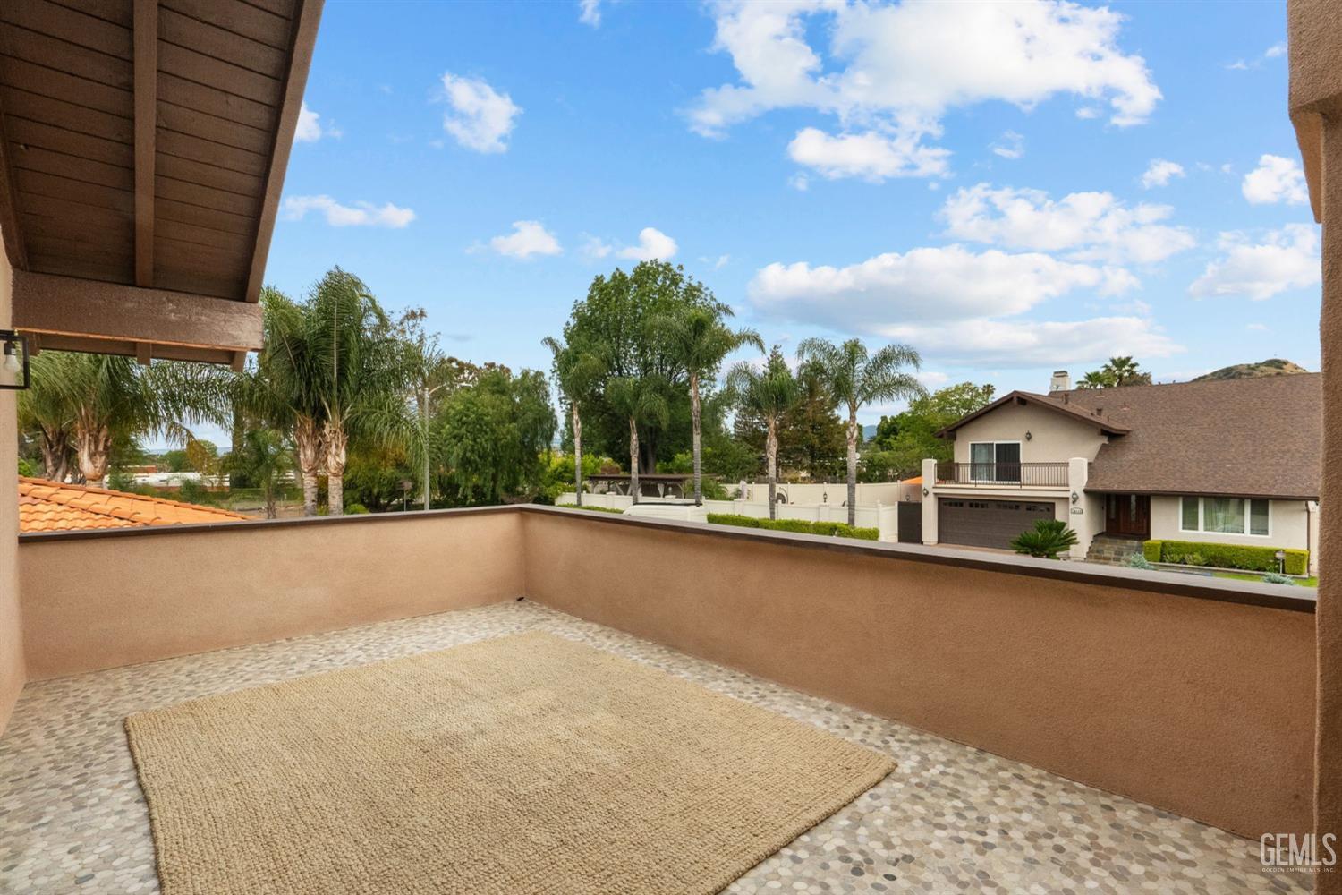 Undisclosed Address Sun Valley, CA 91352 - Photo 43 of 44 a view of a house with a swimming pool and sitting area