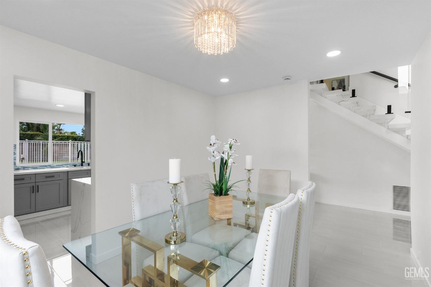 Undisclosed Address Sun Valley, CA 91352 - Photo 7 of 44 a living room with furniture and a chandelier