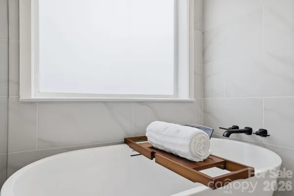 a room with a couch and a window