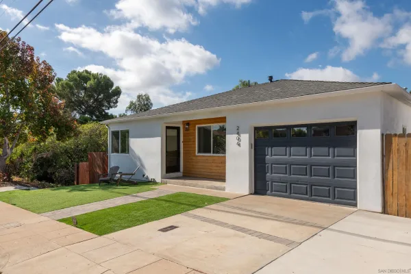 front view of a house with a yard