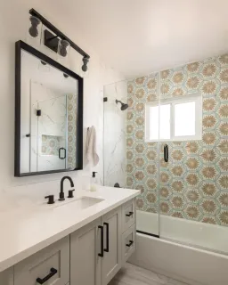 a bathroom with a sink and a mirror