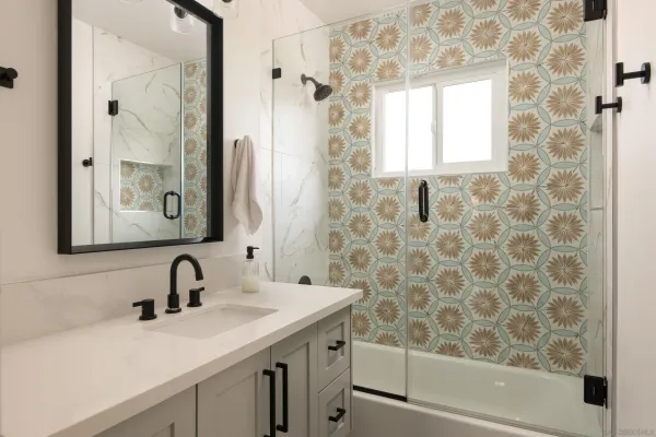 a bathroom with a sink and a mirror