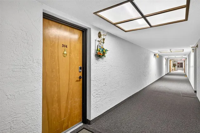 a view of an apartment with a garden