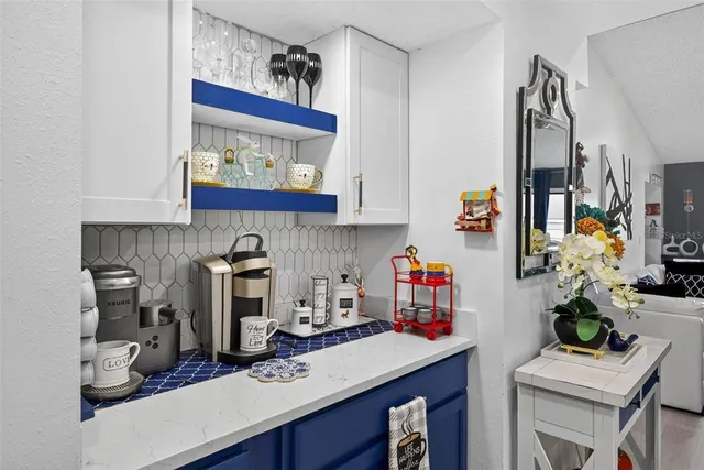 a room with furniture and a sink