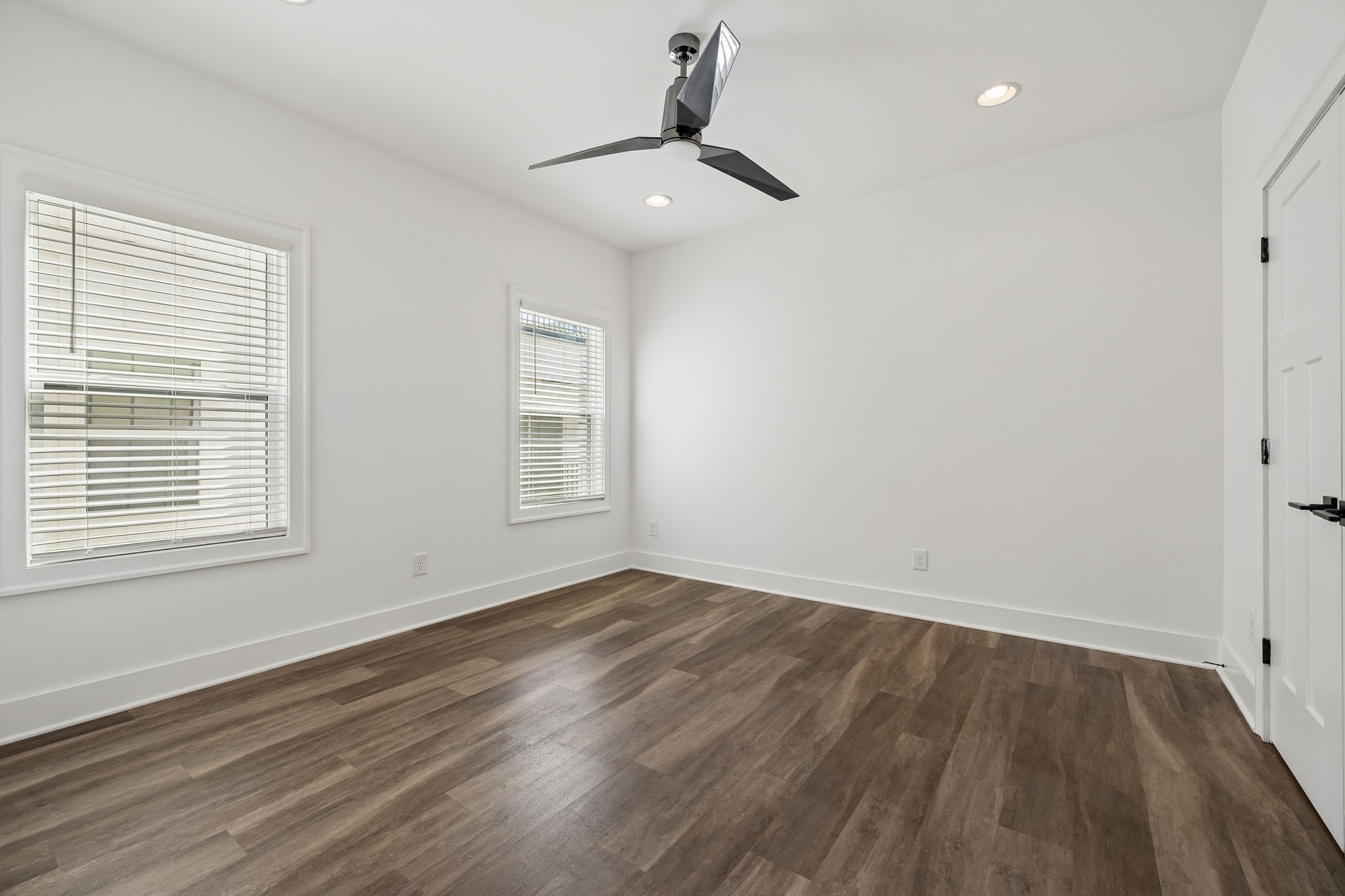 904 North Maple Street Murfreesboro, TN 37130 - Photo 15 of 34 a view of an empty room with wooden floor and a window