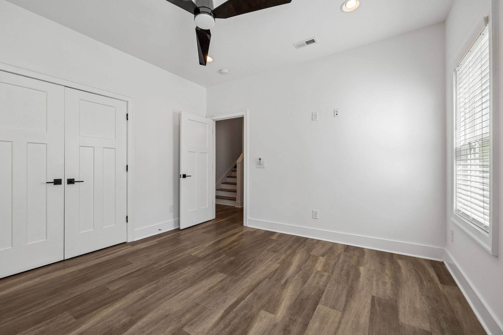 904 North Maple Street Murfreesboro, TN 37130 - Photo 16 of 34 wooden floor in an empty room with a window