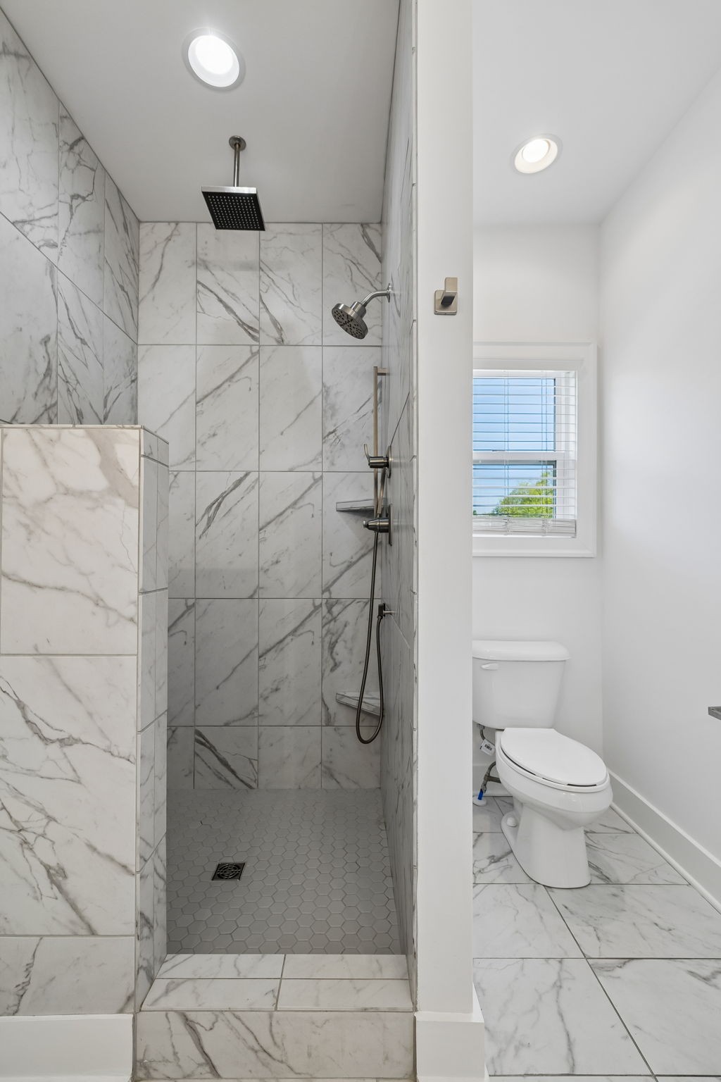 904 North Maple Street Murfreesboro, TN 37130 - Photo 21 of 34 a bathroom with a toilet and a shower