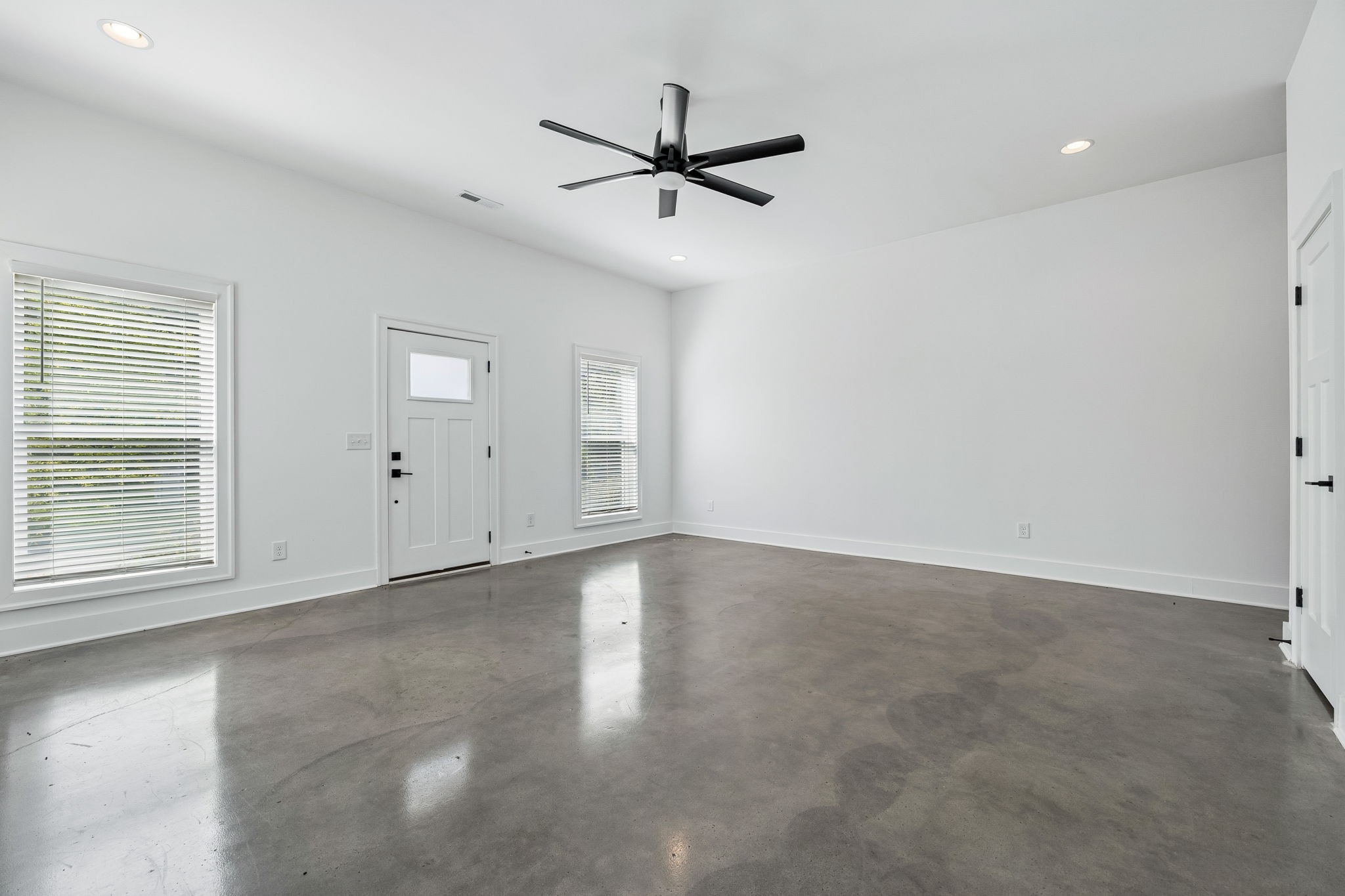 904 North Maple Street Murfreesboro, TN 37130 - Photo 7 of 34 an empty room with window and ceiling fan